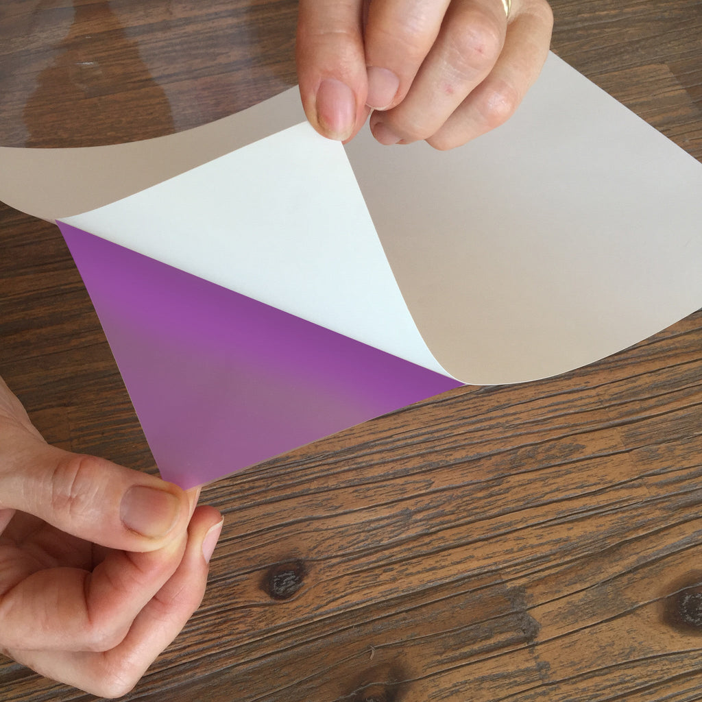 Photochromic adhesive film stickers